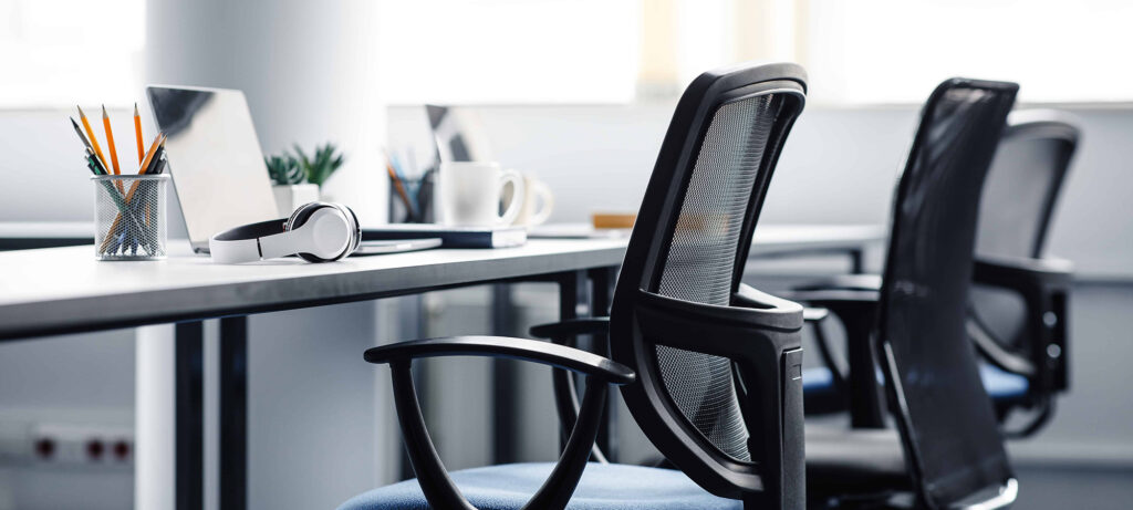 A row of desks in an office