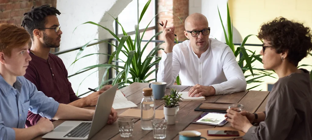 Cloudbooking employees discussing hybrid working