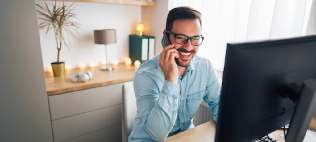 a man at his home office working productively remotely